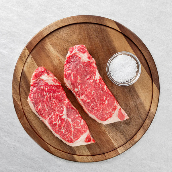 2 - 9 oz ny strip steaks